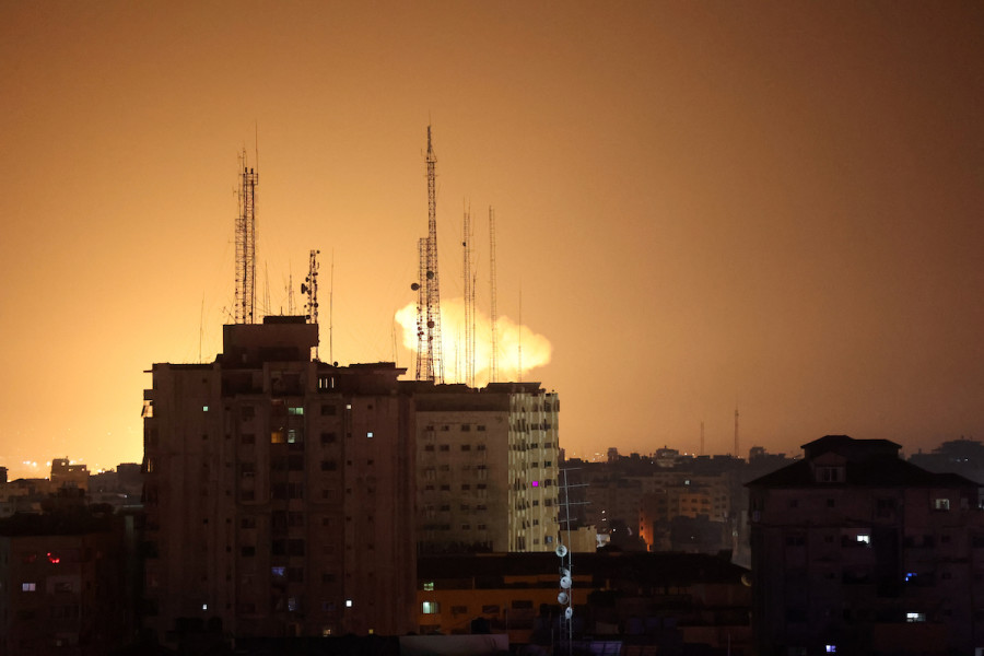 A ball of fire and smoke rises during Israeli airstrikes in the Gaza Strip, early on Jan. 27, 2023. Photo by Attia Muhammed/Flash90
