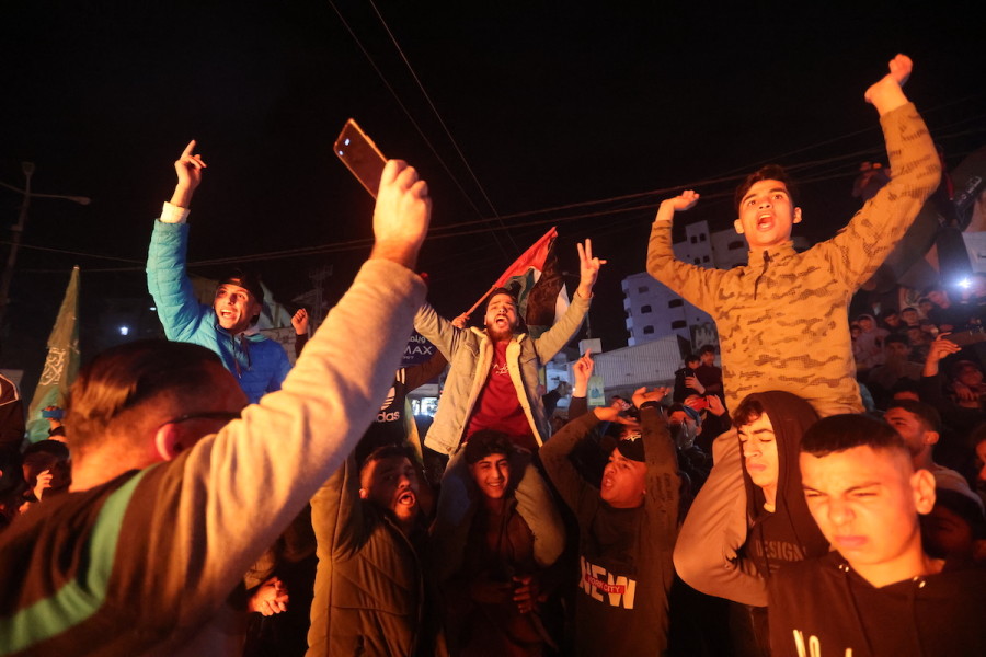 Palestinians in Gaza City celebrate the deadly terror attack in Jerusalem, Jan. 27, 2023. (Photo: Atia Mohammed/Flash90)