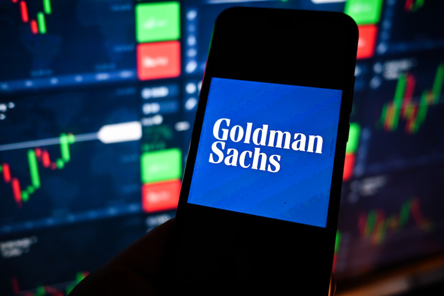 Illustrative - A Goldman Sachs logo displayed on a smartphone with stock market percentages in the background. (Photo: Omar Marques/SOPA Images/Sipa USA)