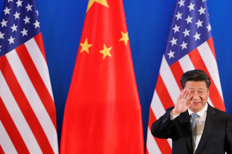 China's President Xi Jinping waves during the joint opening ceremony of the 8th round of U.S.-China Strategic and Economic Dialogues, in Beijing June 6, 2016. REUTERS/Damir Sagolj