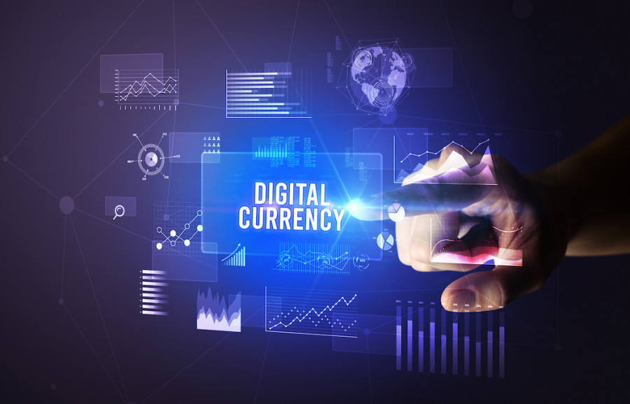 Hand touching digital currency inscription (Photo: Shutterstock)