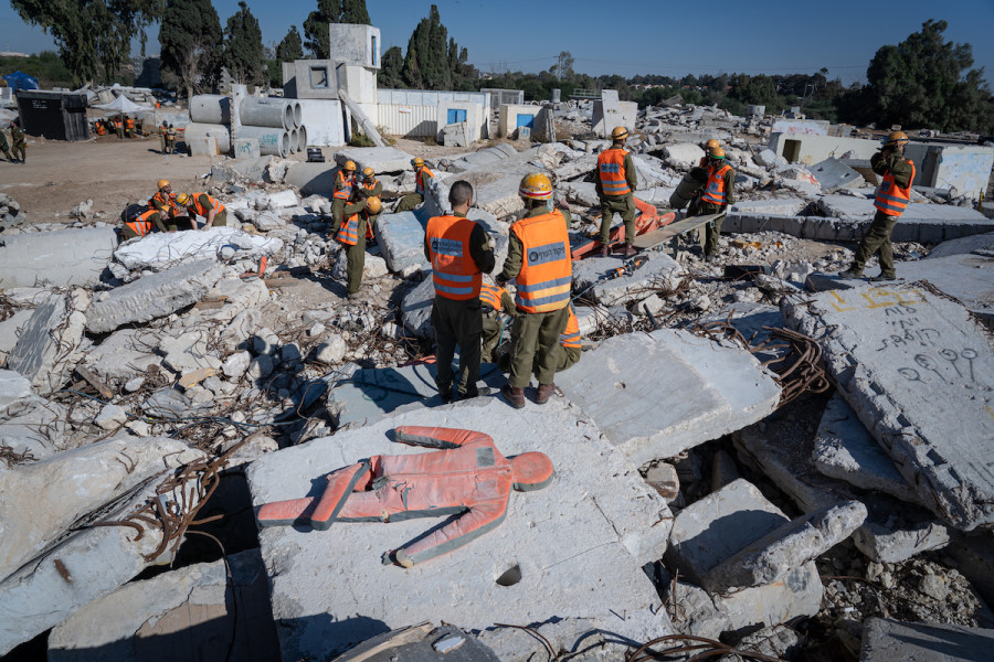 Members of the Knesset Honor Guard, Home Front Command, Firefighters, IDF and Israel's Magen David Adom Emergency Medical Services participate in an emergency drill simulating an earthquake near Ashkelon, Dec. 19, 2019. (Photo: Yaniv Nadav/Flash90)