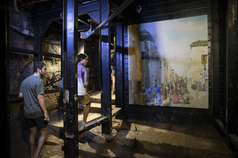 Tourists walk up the main drainage tunnel that leads from the Pool of Siloam Pool up to the Davidson's Center Archeological Park by the Western Wall, July 22, 2019. (Photo: Hadas Parush/Flash90)