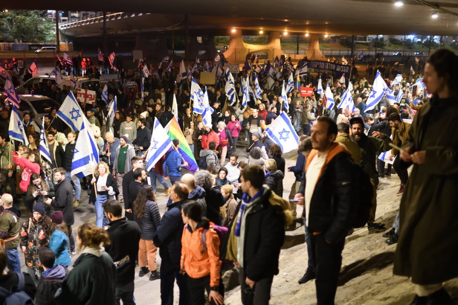 Israeli protesters rally on Ayalon Highway during a protest against Prime Minister Benjamin Netanyahu's new government, in Tel Aviv, Feb. 11, 2023. (Photo: Gili Yaari /Flash90)