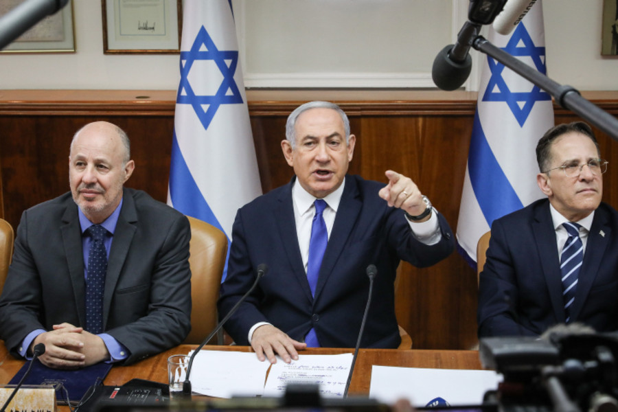 Israeli Prime Minister Benjamin Netanyahu and Minister of Regional Cooperation, Tzachi Hanegbi, attend the weekly Cabinet meeting, at the Prime Minister's office in Jerusalem, Dec. 29, 2019. (Photo: Marc Israel Sellem)