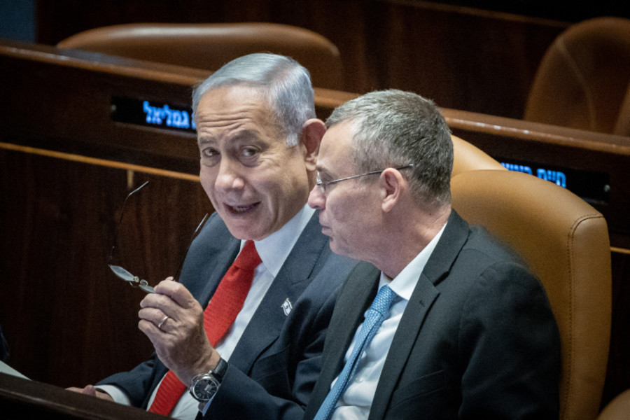 Israeli Prime Minister Benjamin Netanyahu with Justice Minister Yariv Levin during a discussion and a vote in the Knesset assembly hall in Jerusalem, Feb. 20, 2023. (Photo: Yonatan Sindel/Flash90)