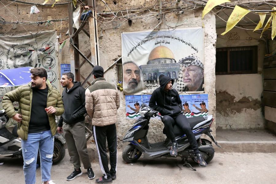 Tributes and political slogans hang on the walls of Shatila Palestinian camp in Beirut, Lebanon, Jan. 13, 2023. (Photo: Elisa Gestri/Sipa USA)