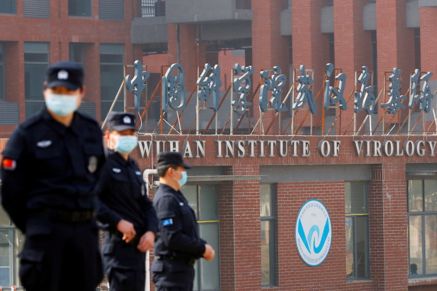 Security personnel keep watch outside the Wuhan Institute of Virology during the visit by the World Health Organization (WHO) team tasked with investigating the origins of the coronavirus disease (COVID-19), in Wuhan, China, Feb. 3, 2021. (Photo: REUTERS/Thomas Peter/File Photo)