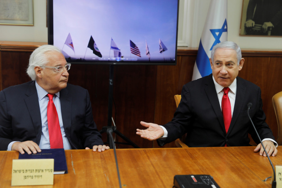 Israeli Prime Minister Benjamin Netanyahu and then-U.S. Ambassador to Israel David Friedman talk after watching a video of Israel's U.S.-backed Arrow-3 ballistic missile shield performing a series of live interception tests over Alaska, July 28 2019. (Photo: Menahem Kahana/Pool via REUTERS)