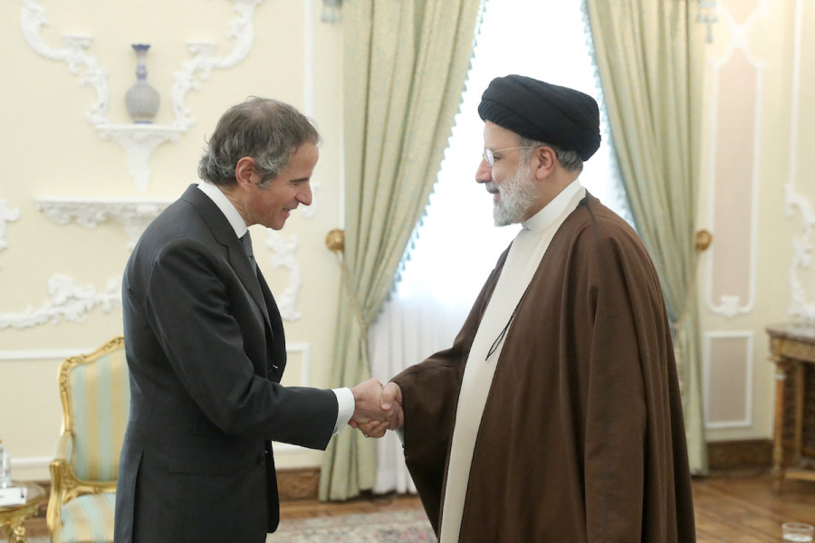 Iranian President Ebrahim Raisi shakes hands with International Atomic Energy Agency (IAEA) Director General Rafael Grossi in Tehran, Iran, Mar. 4, 2023. (Photo:Iran's President Website/WANA/Handout via REUTERS)