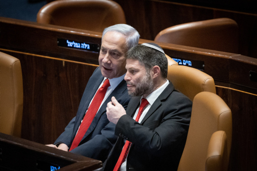 Israeli Prime Minister Benjamin Netanyahu speaks with Finance Minister Bezalel Smotrich during a discussion and a vote on the government's judicial overhaul plans in the Knesset assembly hall in Jerusalem, Feb. 20, 2023. (Photo: Yonatan Sindel/Flash90)