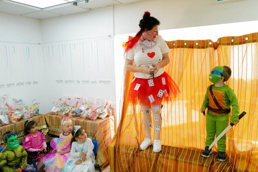 Israelis dressed up in costumes for the Jewish holiday of Purim, at a school in Katzrin, Golan Heights, Mar. 5, 2023. (Photo: Michael Giladi/Flash90)