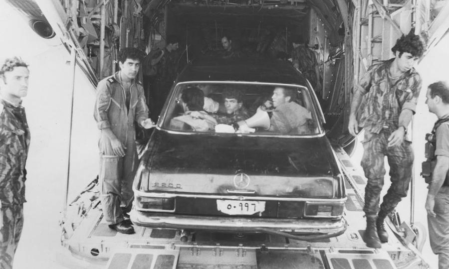 Commandos from Sayeret Matkal with the Mercedes they used to deceive the Ugandans (Photo: IDF Spokesman)