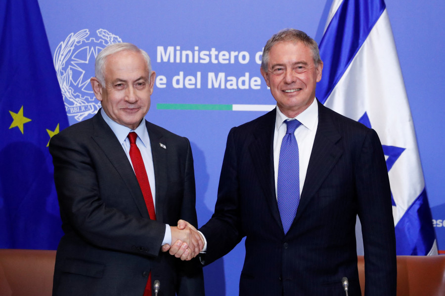 Israeli Prime Minister Benjamin Netanyahu shakes hands with Italy's Minister for Industry and Made in Italy Adolfo Urso, in Rome, Italy, March 10, 2023. REUTERS/Remo Casilli