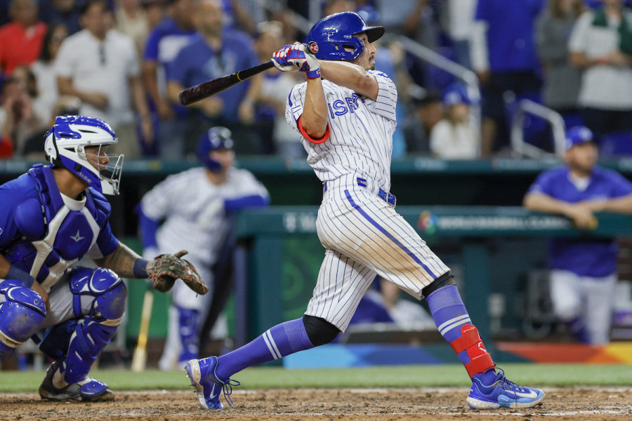 Israel third baseman Garrett Stubbs (21) hits a two-run double during the eighth inning against Nicaragua at LoanDepot Park. Mandatory Credit: Sam Navarro-USA TODAY Sports