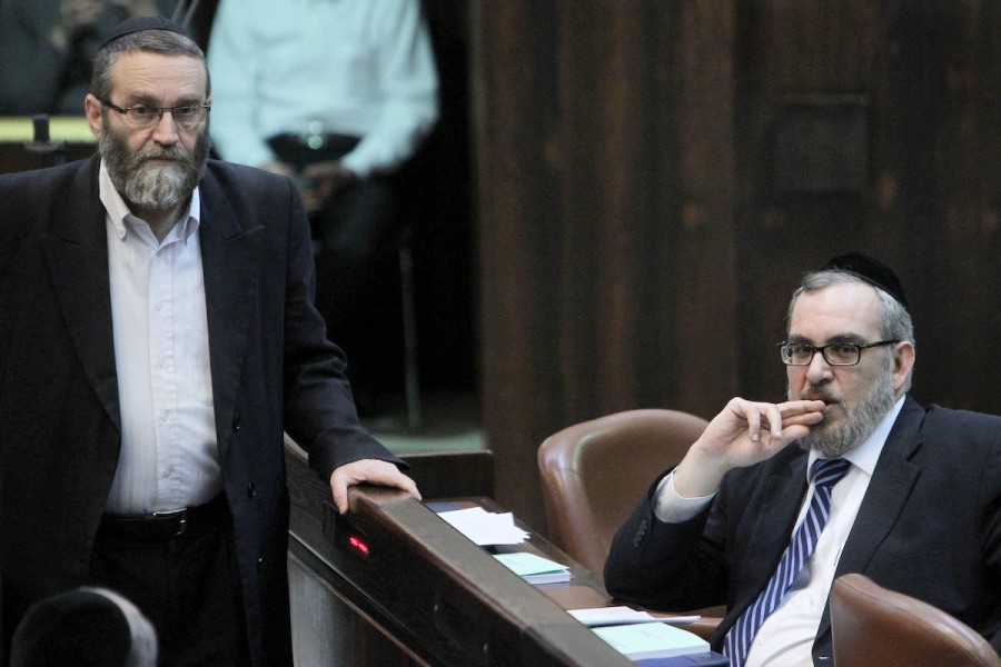 United Torah Judaism Knesset Members Moshe Gafni (L) and Yaakov Asher seen in the plenum hall of the Israeli parliament, Feb. 11, 2013. (Photo: Miriam Alster/Flash90)