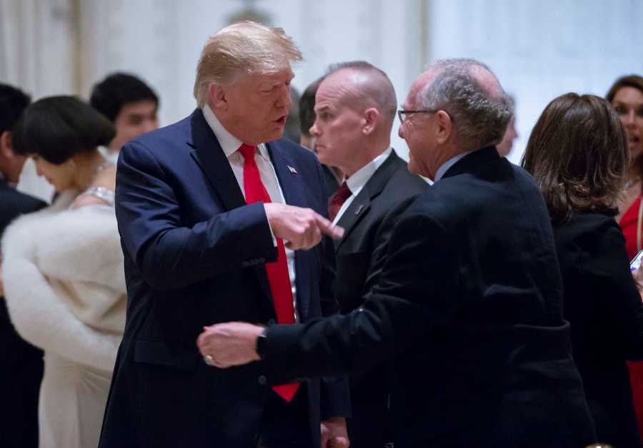 Then-U.S. President Donald Trump talks with attorney Alan Dershowitz before a Christmas dinner in the ballroom at Mar-a-Lago in Palm Beach, Dec. 24, 2019. (Photo: USA TODAY NETWORK via Reuters)