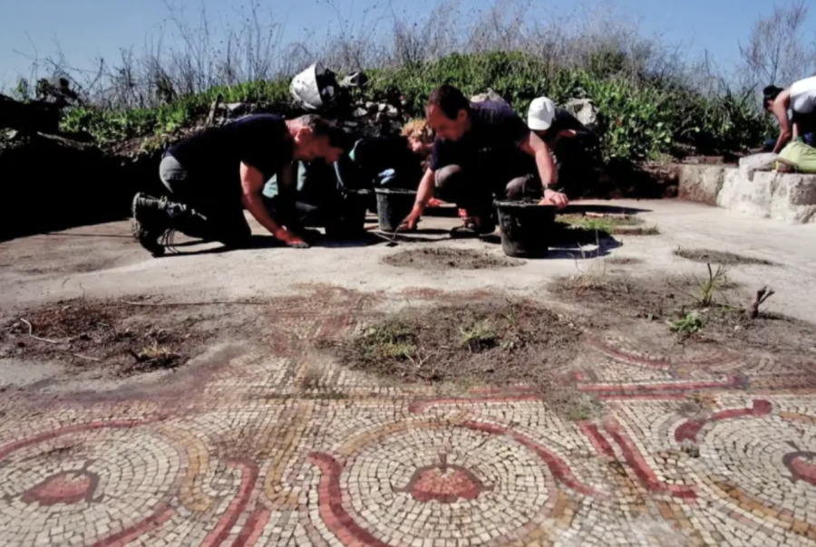 Volunteers helping uncover a Roman-era church mosaic floor (Photo: Emil Aladjem/IAA)