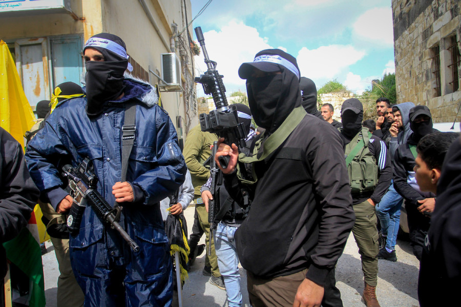 Palestinian gunmen and mourners attend the funeral of three Palestinians killed in a shootout with Israeli security forces in the West Bank village of Jaba, Mar. 9, 2023. (Photo: Nasser Ishtayyeh/Flash90)