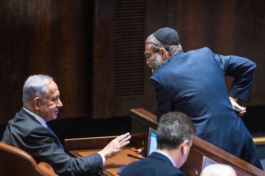 Benjamin Netanyahu with Moshe Gafni at a vote in the Knesset assembly hall in Jerusalem, Dec. 28, 2022. (Photo: Olivier Fitoussi/Flash90)