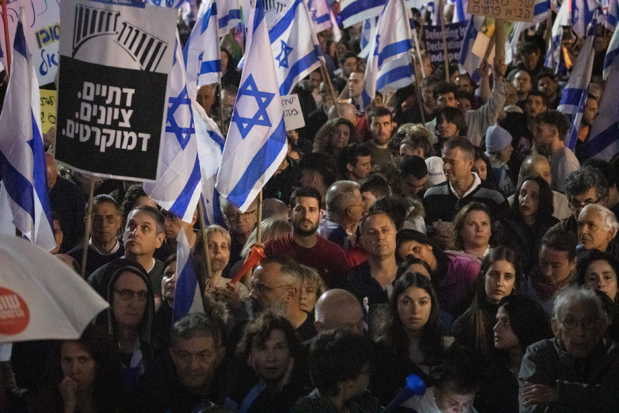 Israelis protest against the Israeli government's planned judicial overhaul, in Haifa, Mar. 25, 2023. (Photo: Shir Torem/Flash90)