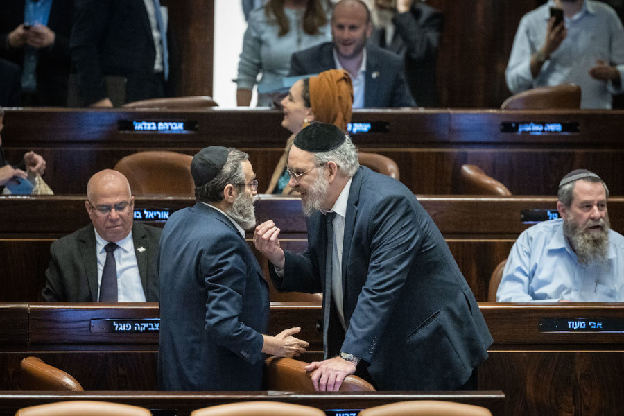 MK Moshe Gafni with MK Yaakov Asher during a discussion and a vote on the Hametz Law in the Knesset assembly hall in Jerusalem, Mar. 28, 2023. (Photo: Yonatan Sindel/Flash90)