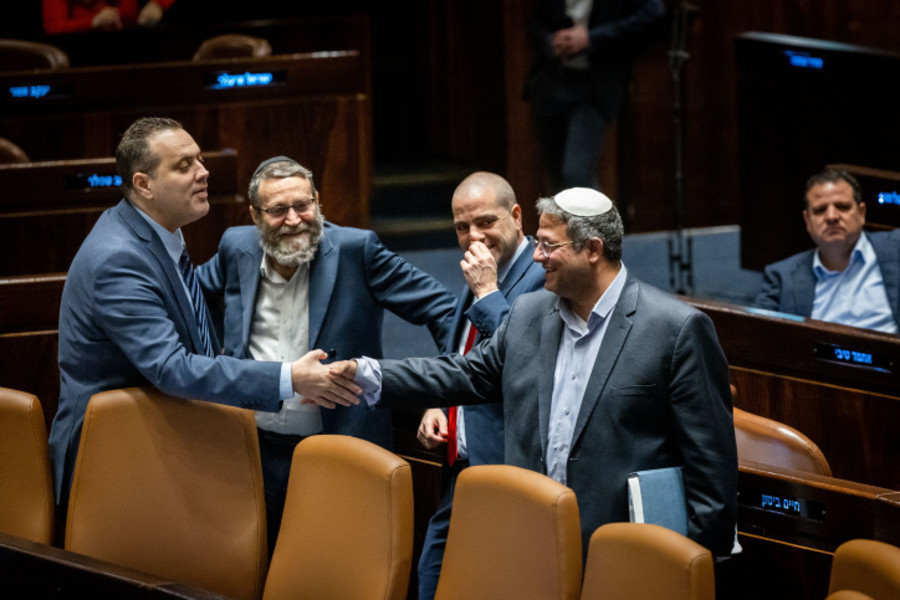 Itamar Ben-Gvir, Minister of National Security with Minister of Culture and Sports Miki Zohar and MK's during a discussion and a vote in the assembly hall of the Knesset, the Israeli parliament in Jerusalem, on March 6, 2023. Photo by Yonatan Sindel/Flash90