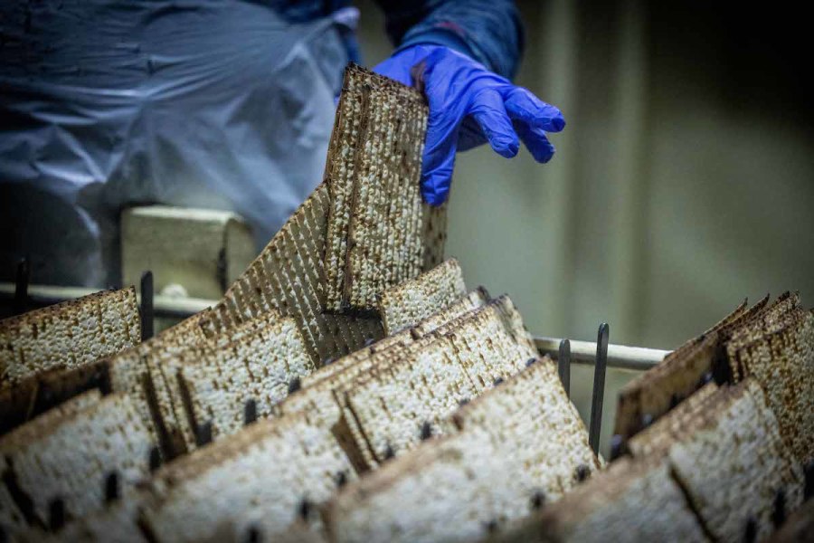 Workers prepare matzah, traditional unleavened bread eaten during Passover, in Jerusalem, Mar. 29, 2023. (Photo: Yonatan Sindel/Flash90)
