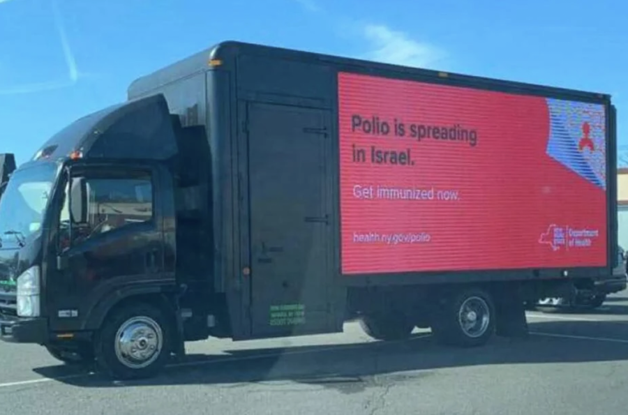 New York State Department of Health truck with an advertisement - 'Polio Spreads in Israel' (Photo: Avi Brown)