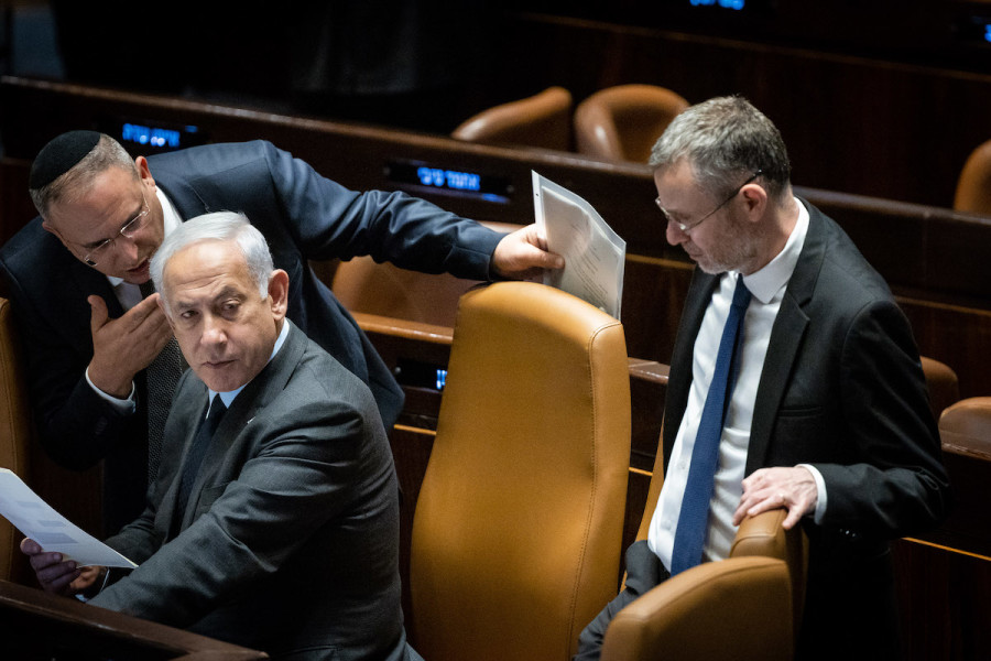 Israeli Prime Minister Benjamin Netanyahu with Justice Minister Yariv Levin at a discussion and a vote in the Knesset assembly hall in Jerusalem, Mar. 27, 2023. (Photo: Yonatan Sindel/Flash90)