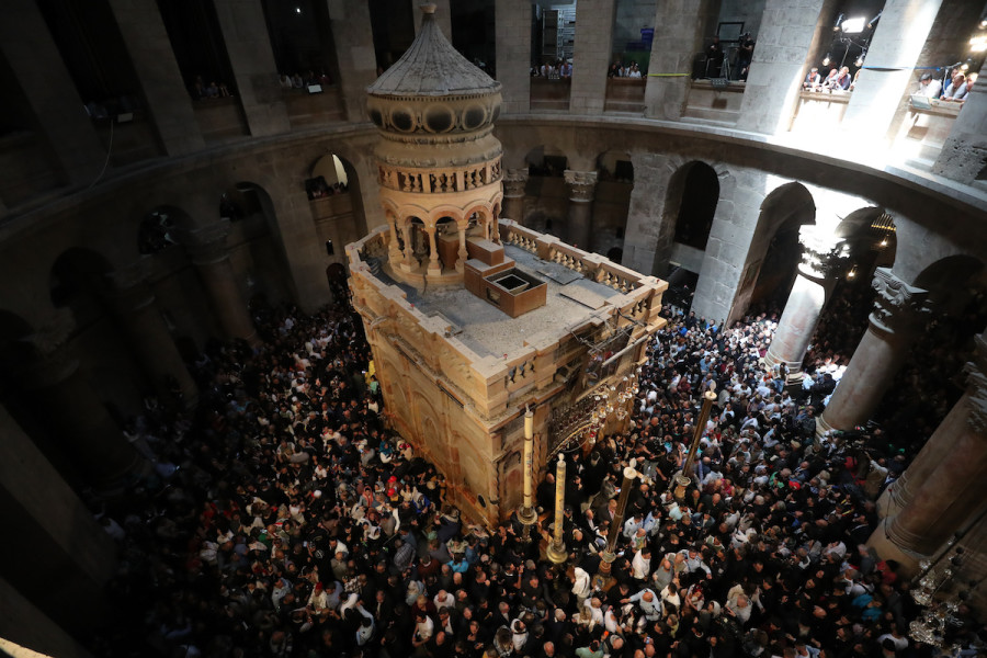 Orthodox Christian worshippers take part in the Holy Fire ceremony at the Church of the Holy Sepulchre in Jerusalem's Old City during Orthodox Easter holiday, April 15, 2023. (Photo: Jamal Awad/Flash90)