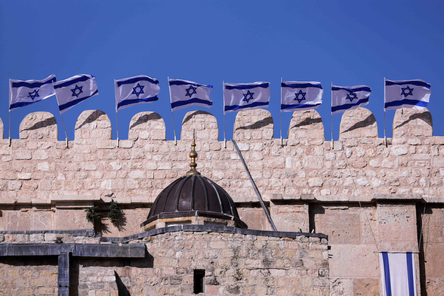 Israeli flags are hanging on the Tomb of the Patriarchs in Hebron, Apr. 24, 2023. (Photo: Wisam Hashlamoun/Flash90)