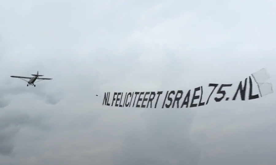 An airplane with the banner celebrating Israel's 75th Independence Day (Poto: Video screenshot - Courtesy of Christians for Israel)