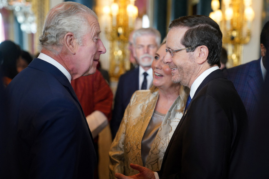 Britain's King Charles speaks with Israeli President Isaac Herzog and his wife, Michal, during a reception for overseas guests attending his coronation at Buckingham Palace in London, May 5, 2023. (Photo: Jacob King/Pool via Reuters)