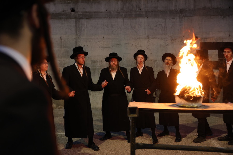 Grand Rabbi of Shomer Emunim and his followers light a bonfire a day before the Lag Ba'Omer celebrations, in Meron, May 7, 2023. (Photo: David Cohen/Flash90)