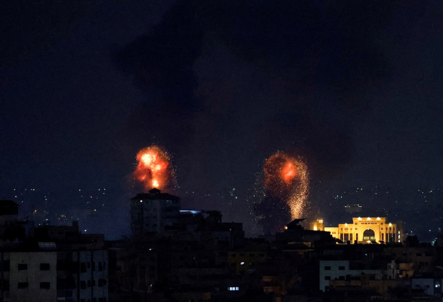 Explosions light up the sky after the Israeli military said in a statement that it has struck Islamic Jihad targets in Gaza, May 9, 2023. (Photo: REUTERS/Mohammed Salem)
