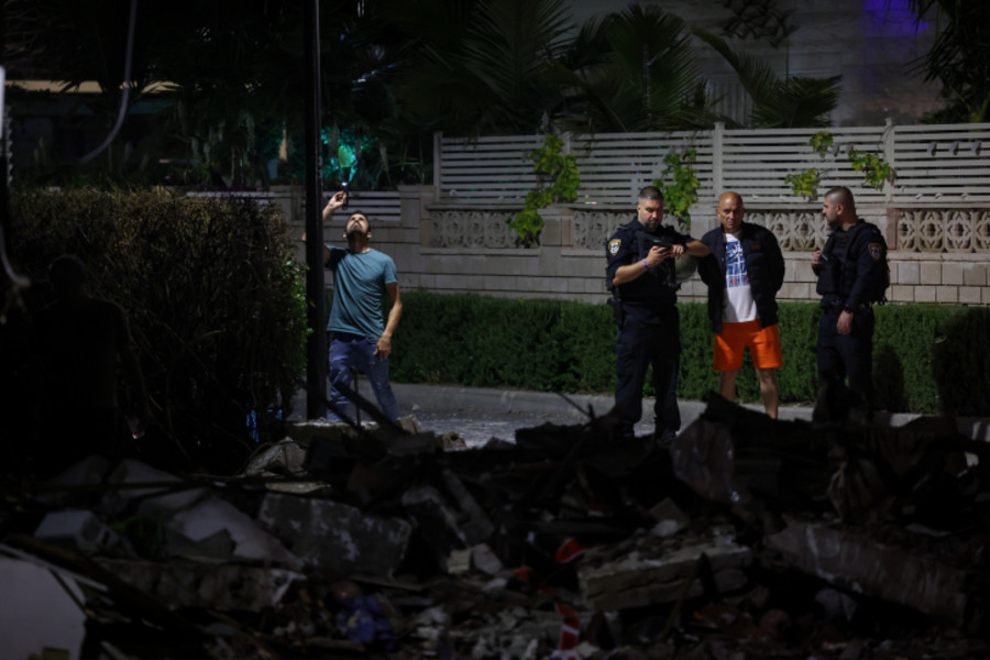 Police and army at the scene where a rocket fired from Gaza into southern Israel hit and caused damaged in between houses in the city of Ashkelonת May 10, 2023. (Photo: Yonatan Sindel/Flash90)