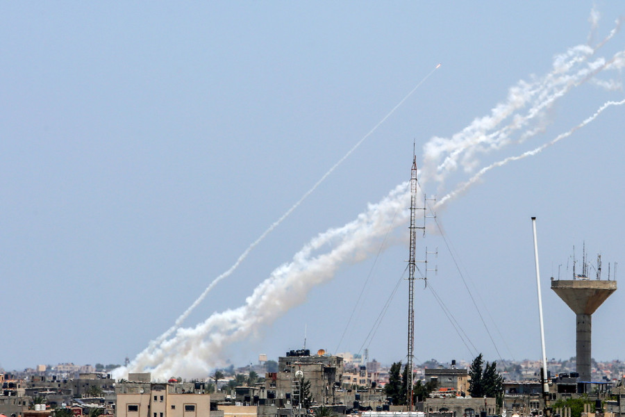 Trails of smoke are seen as rockets are fired from Gaza towards Israel, in Khan Younis, southern Gaza Strip, on May 13, 2023. (Photo: Abed Rahim Khatib/Flash90)
