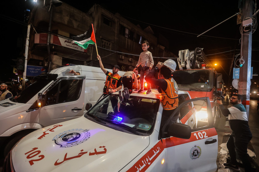 Palestinians celebrate on the street after Palestinian factions and Israel agreed on a ceasefire, in Gaza, May 13, 2023. (Photo: Atia Mohammed/Flash90)
