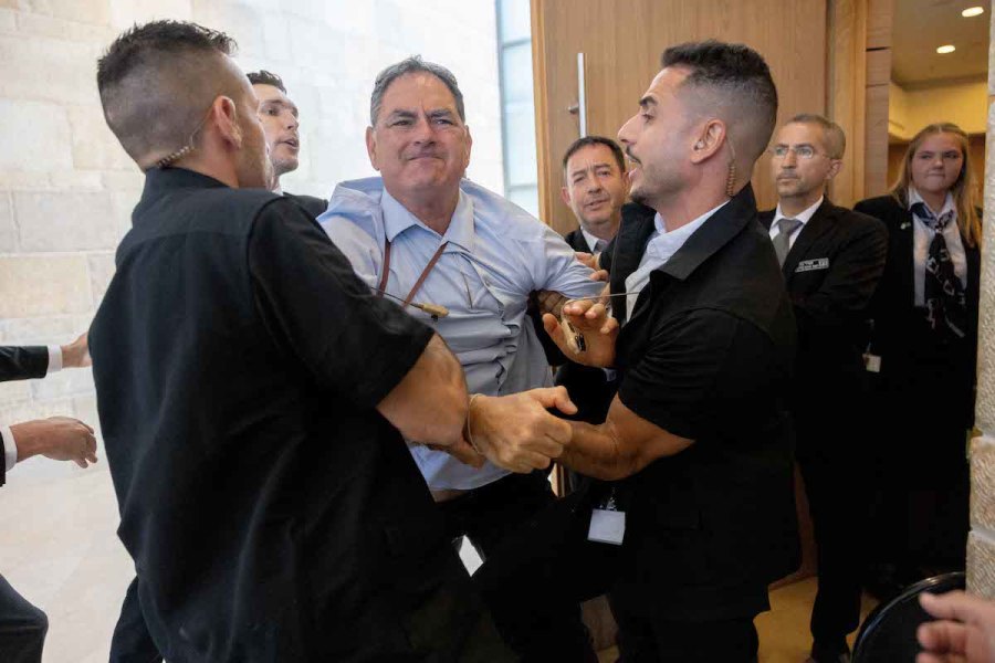 Hizky Sivak of the Emek Hefer Regional Council is forceably removed by Knesset guards from a Finance Committee meeting and vote on the Arnona Fund, at the Knesset in Jerusalem, May 15, 2023. (Photo: Yonatan Sindel/Flash90)