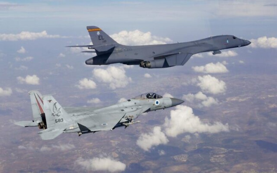 An Israeli F-15 fighter jet escorts an American B-1b heavy bomber through Israeli airspace, on Oct. 30, 2021. (Israel Defense Forces)