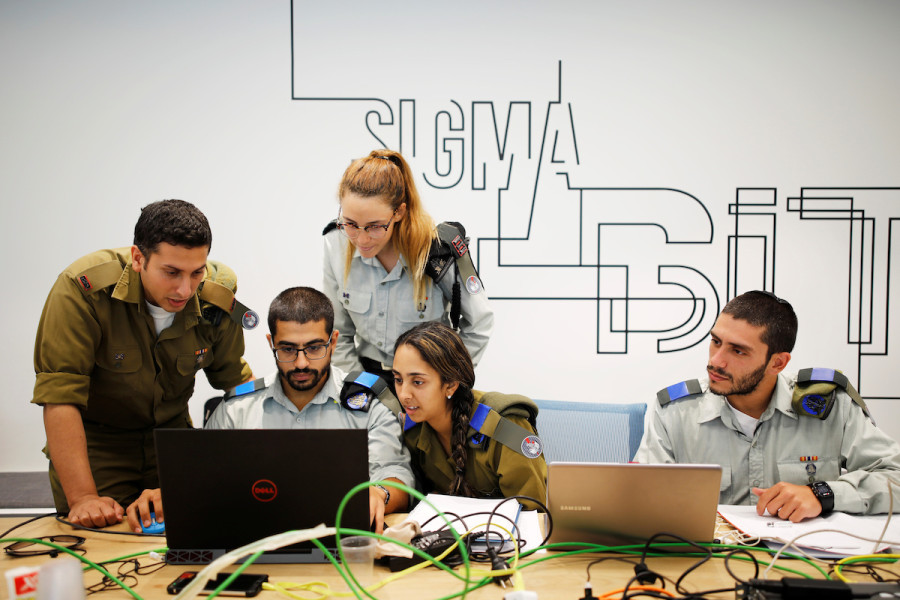 Illustrative - Israeli soldiers work on laptops as they take part in a cyber security training course, Aug. 28, 2017. (Photo: REUTERS/Amir Cohen)