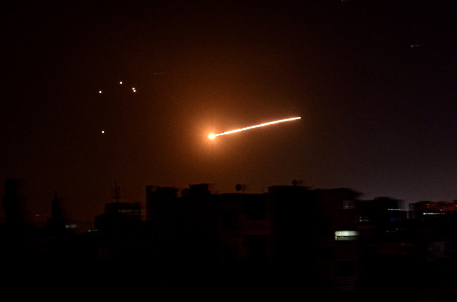 Illustrative - A streak of light is seen in the night sky in the vicinity of the Syrian capital Damascus during what Syrian authorities said was an Israeli air strike, in this handout released by state news agency SANA on Feb. 24, 2020. (Photo: SANA/Handout via Reuters)