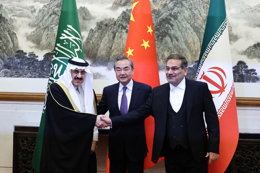 Wang Yi, director of the Office of the Central Foreign Affairs Commission, Ali Shamkhani, the secretary of Iran’s Supreme National Security Council, and Minister of State and National Security Advisor of Saudi Arabia Musaad bin Mohammed Al Aiban pose for pictures during a meeting in Beijing, China, Mar. 10, 2023. (Photo: China Daily via REUTERS)