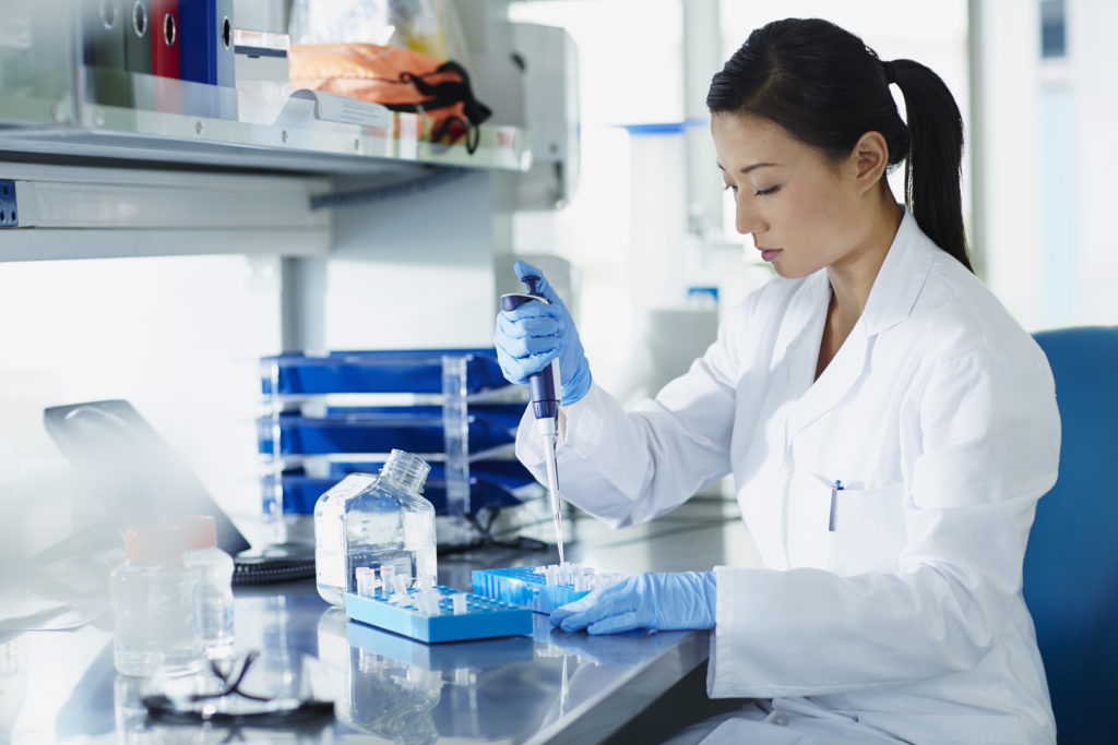 Person in laboratory testing fermented food | HealthMasters