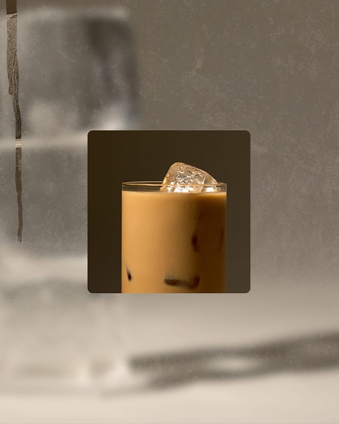 image of iced latte overlayed on image of frosted glass