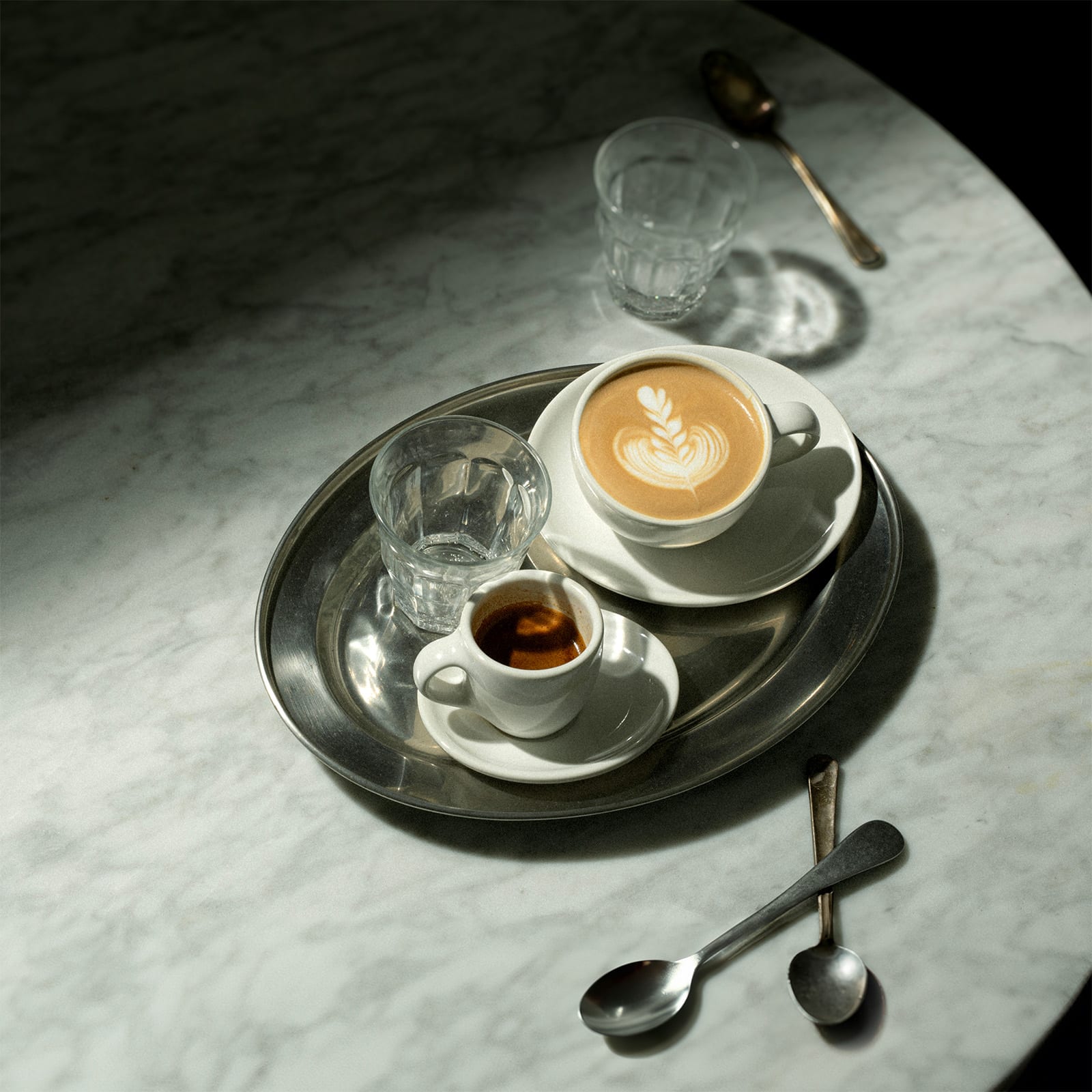 espresso and latte on tray blue bottle coffee