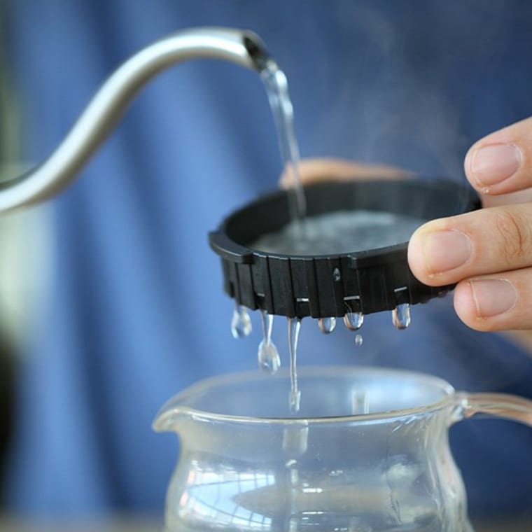 Water being poured over a filter