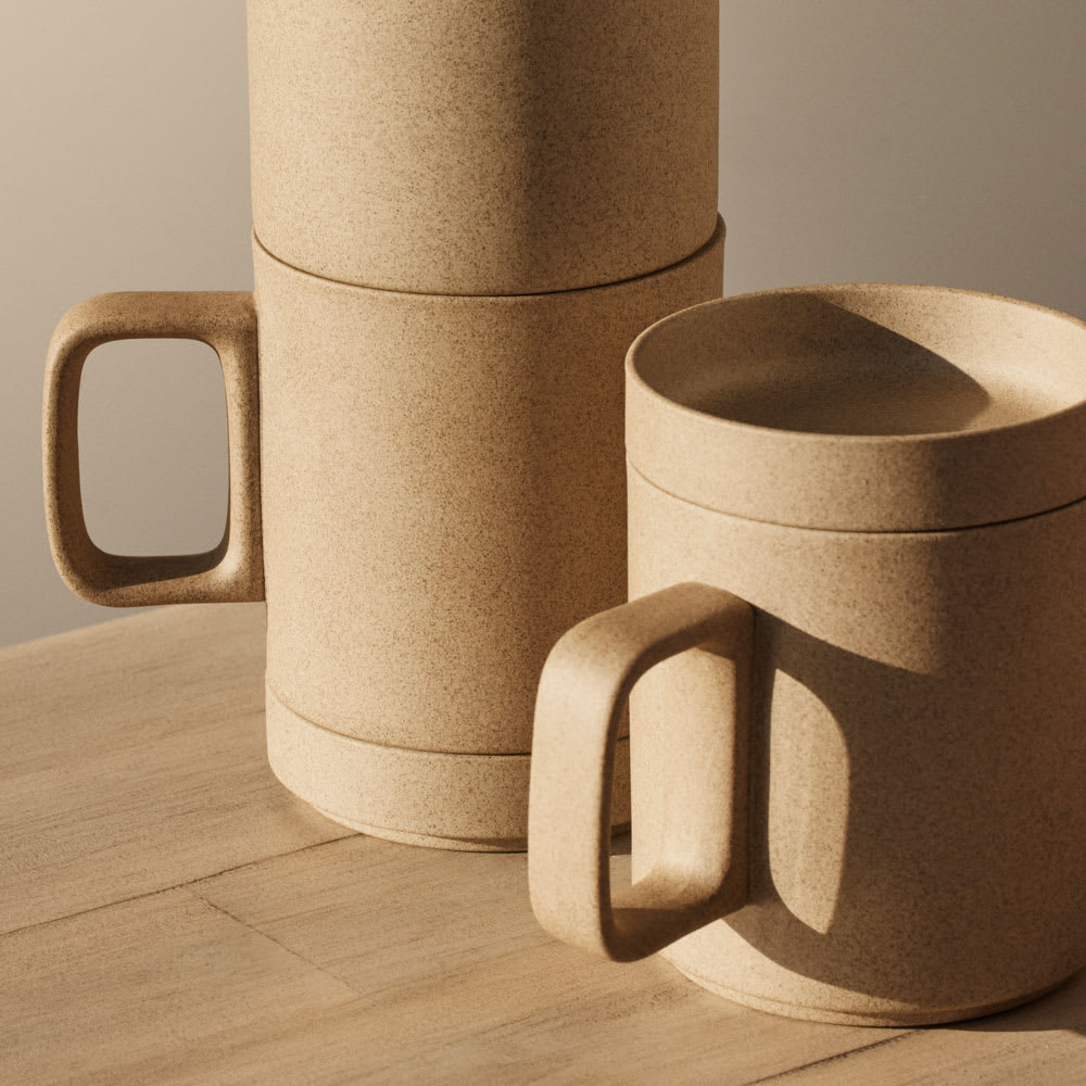 Hasami Natural Mug with Saucer on table