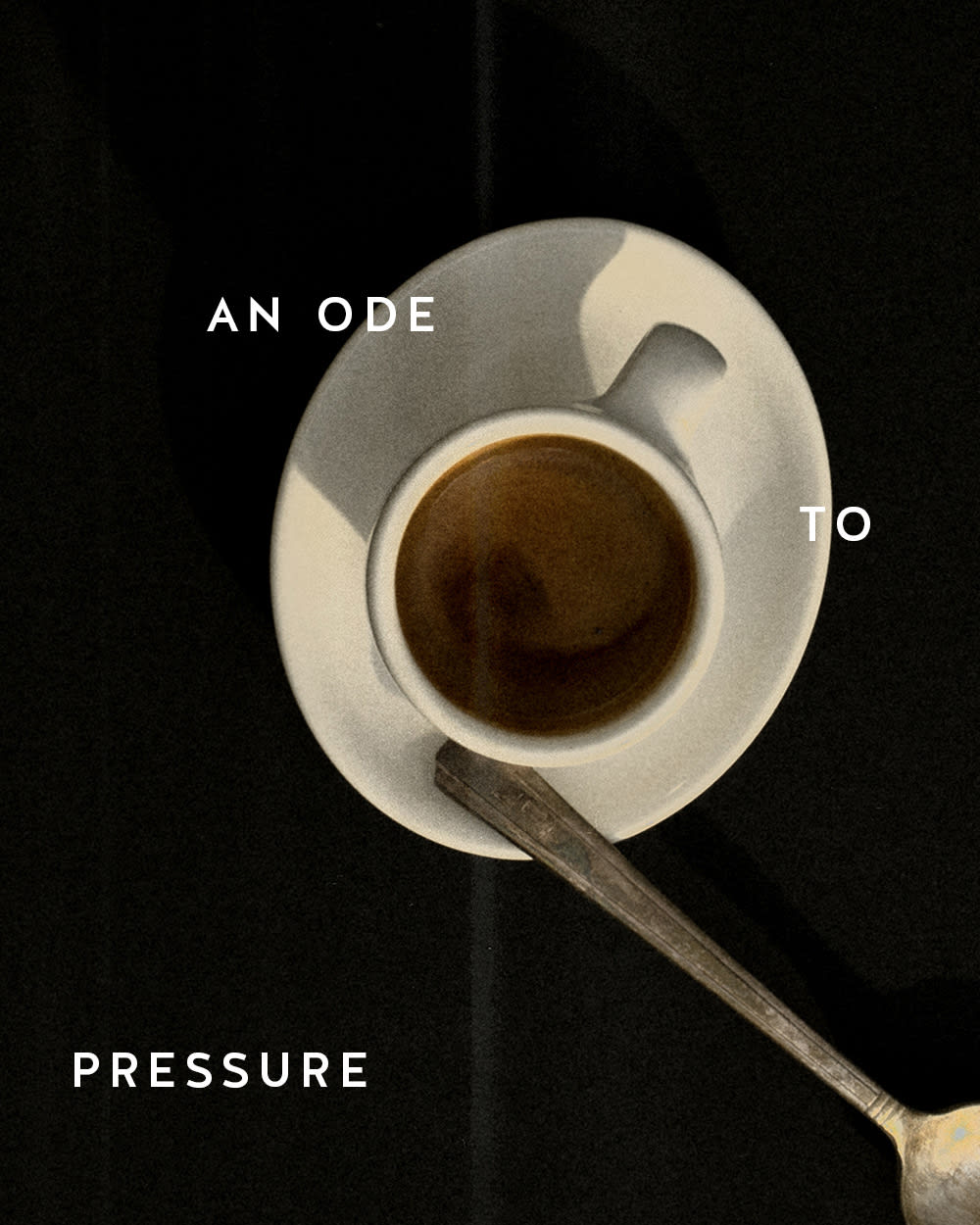 Cup of espresso with spoon an ode to pressure 